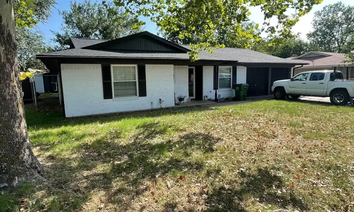 Professional roofing crew working on a residential roof in Presque Isle